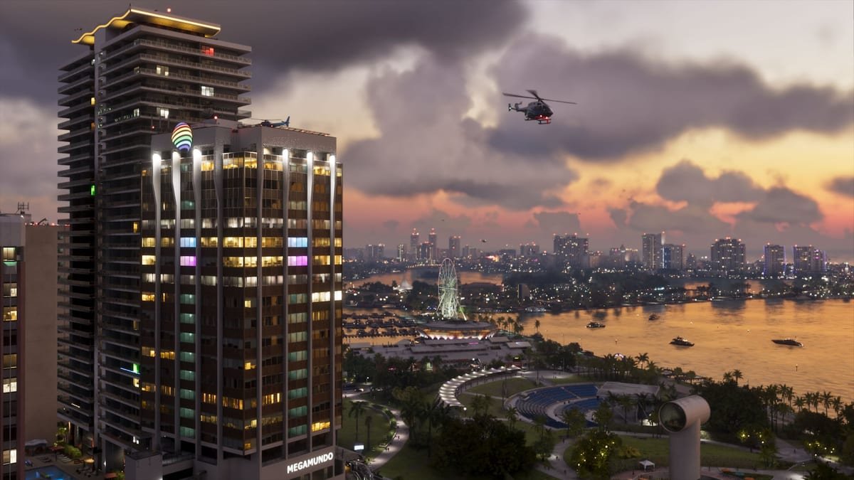 Rua de Vice City vista do alto, com carros e palmeiras